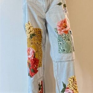 Upcycled cargo jeans embellished with flower applique and bandana patches.ooak